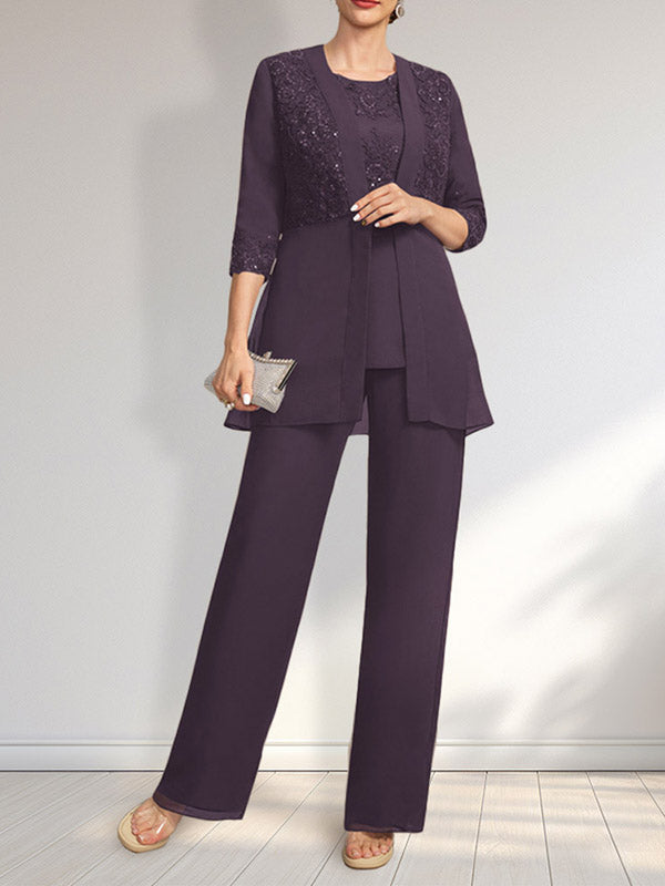 Vestido de novia de gasa con encaje y lentejuelas, estilo mono/traje pantalón, largo hasta el suelo, con escote redondo.