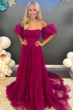 Vestido largo de fiesta corte A, sin tirantes, con volantes y mangas abullonadas
