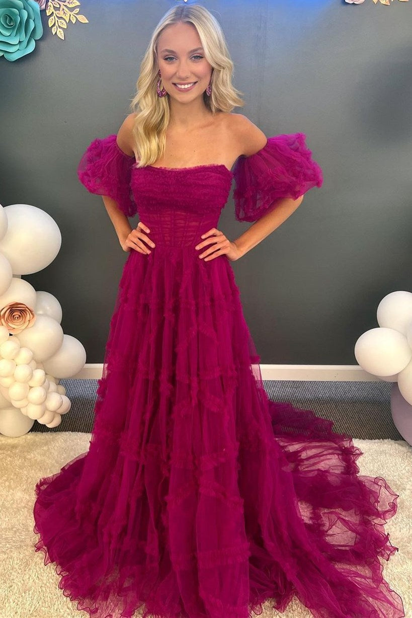 Vestido largo de fiesta corte A, sin tirantes, con volantes y mangas abullonadas