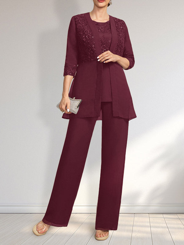 Vestido de novia de gasa con encaje y lentejuelas, estilo mono/traje pantalón, largo hasta el suelo, con escote redondo.
