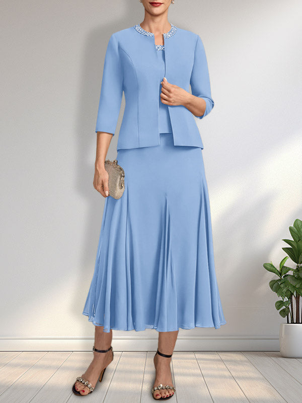 Vestido de novia de gasa, corte línea A, escote redondo, largo té, con lentejuelas y pedrería. 