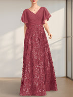 Vestido de novia de corte A, escote en V, largo hasta el suelo, de encaje, lentejuelas y gasa, con pliegues.