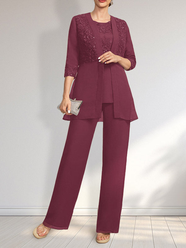 Vestido de novia de gasa con encaje y lentejuelas, estilo mono/traje pantalón, largo hasta el suelo, con escote redondo.