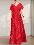 Vestido de novia de corte A, escote en V, largo hasta el suelo, de encaje, lentejuelas y gasa, con pliegues.
