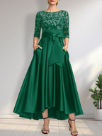 Vestido de madrina de la novia, corte asimétrico, escote ilusión, satén y encaje, con lazo.