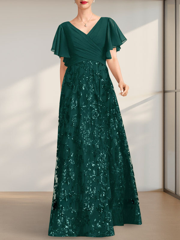 Vestido de novia de corte A, escote en V, largo hasta el suelo, de encaje, lentejuelas y gasa, con pliegues.