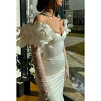 Superbe et charmante robe de bal sirène à manches longues, sans bretelles, en satin, avec fleurs