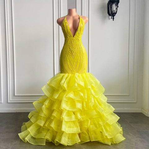 Robe de bal sirène jaune longue à col V dos nu en tulle et dentelle avec volants