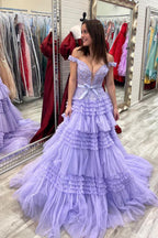 Vestido largo de fiesta rosa claro con escote barco y volantes