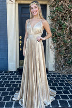 Robe de bal longue plissée dorée à décolleté plongeant en V