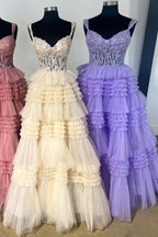 Robe de bal longue en tulle à épaules dénudées et à volants étagés