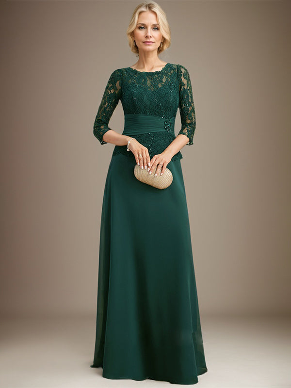 Vestido de corte A, escote ilusión, largo hasta el suelo, de gasa y encaje, para la madre de la novia, con lentejuelas plisadas y pedrería. 