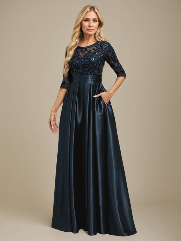 Robe de mariée longue en satin stretch dentelle et dentelle, coupe trapèze, décolleté illusion, ornée d'un nœud à sequins 