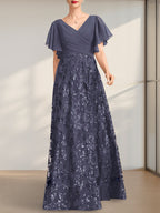 Vestido de novia de corte A, escote en V, largo hasta el suelo, de encaje, lentejuelas y gasa, con pliegues.