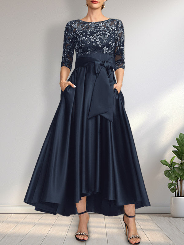 Vestido de madrina de la novia, corte asimétrico, escote ilusión, satén y encaje, con lazo.