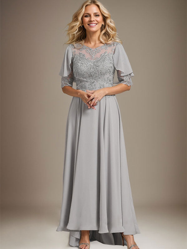 Vestido de novia asimétrico de gasa con encaje, corte en A, escote redondo y ilusión, con pedrería. 