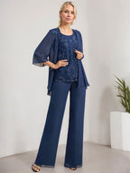 Vestido de novia de gasa con encaje y lentejuelas, estilo mono/pantalón, largo hasta el suelo, con escote redondo.