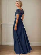 Robe en mousseline de soie bleu marine foncé, coupe trapèze, col bateau et sequins 