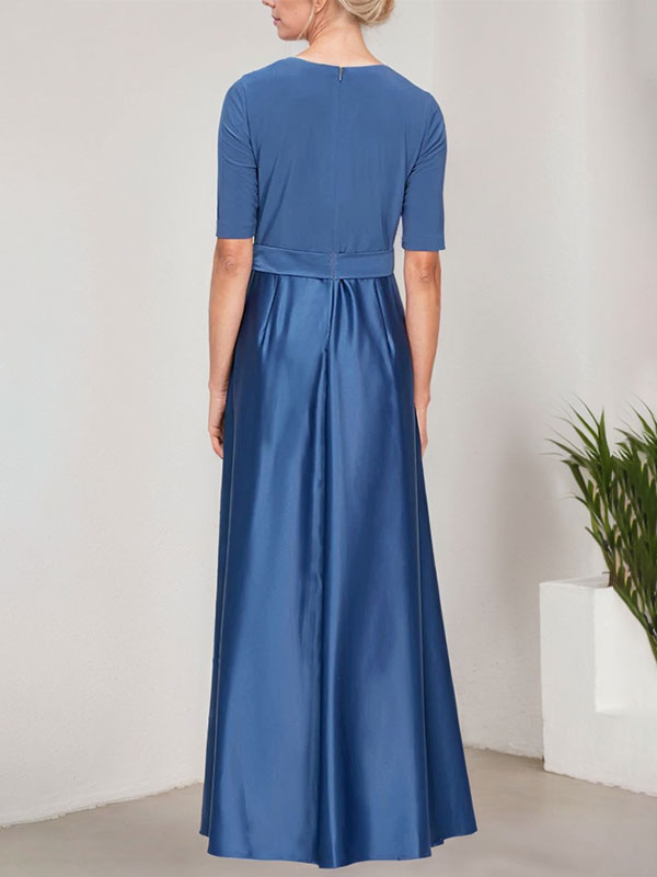 Vestido de baile con escote cruzado, falda amplia de satén y corpiño de jersey. 