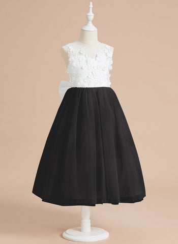 Vestido midi de encaje floral y lazo grande 