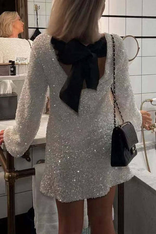 Robe mini ample à paillettes et nœud dans le dos, idéale pour danser toute la nuit 