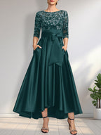 Vestido de madrina de la novia, corte asimétrico, escote ilusión, satén y encaje, con lazo.