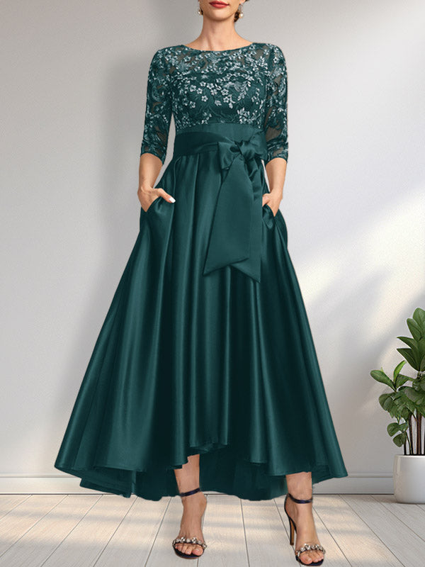 Vestido de madrina de la novia, corte asimétrico, escote ilusión, satén y encaje, con lazo.