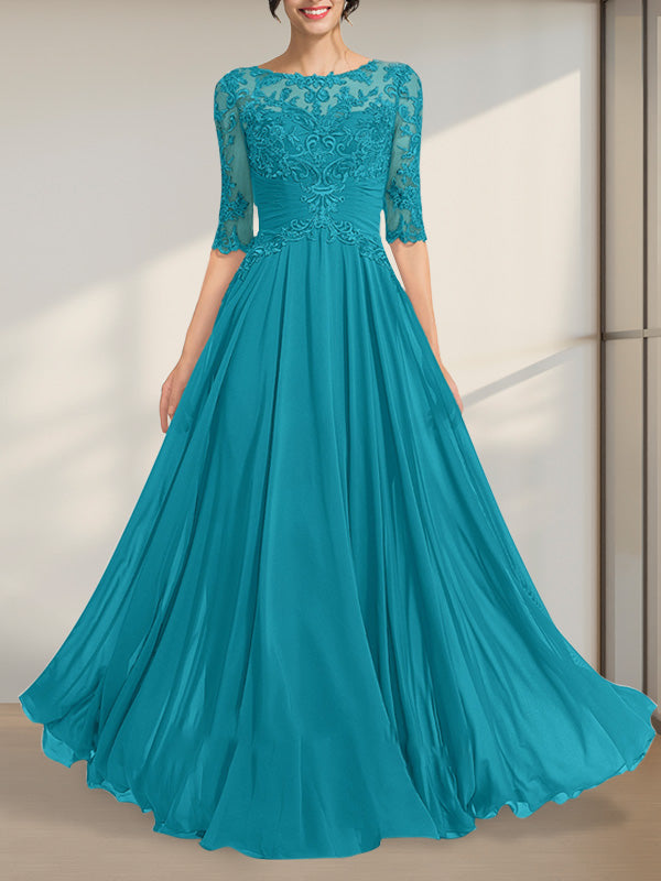 Vestido de novia de corte A, escote ilusión, largo hasta el suelo, de gasa y encaje, con lentejuelas plisadas.