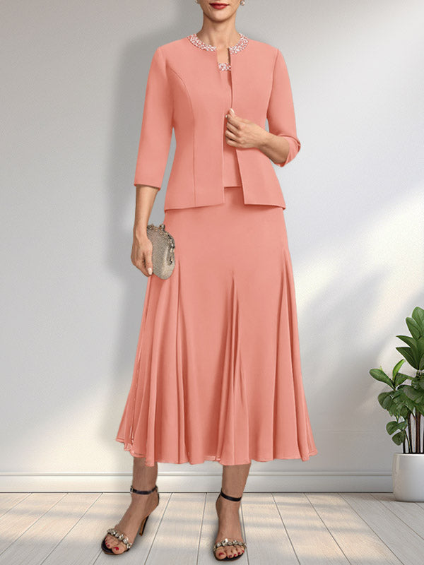 Vestido de novia de gasa, corte línea A, escote redondo, largo té, con lentejuelas y pedrería. 