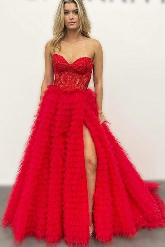 Precioso vestido de fiesta rosa de corte A con escote corazón y corsé, adornado con apliques.