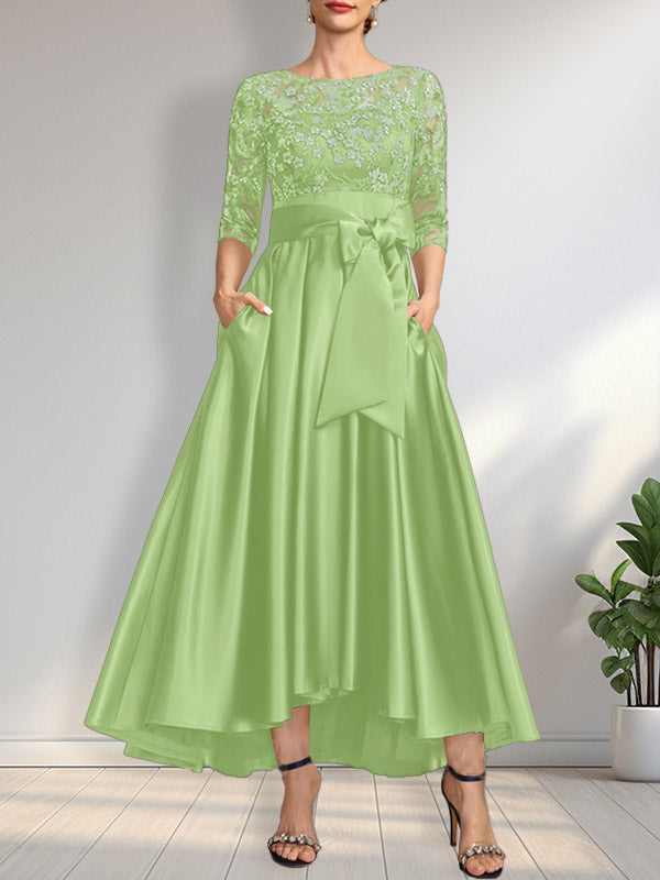 Vestido de madrina de la novia, corte asimétrico, escote ilusión, satén y encaje, con lazo.