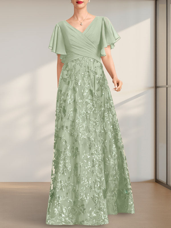 Vestido de novia de corte A, escote en V, largo hasta el suelo, de encaje, lentejuelas y gasa, con pliegues.