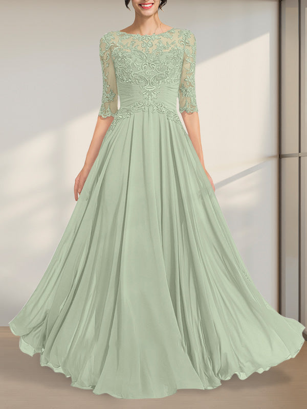 Vestido de novia de corte A, escote ilusión, largo hasta el suelo, de gasa y encaje, con lentejuelas plisadas.
