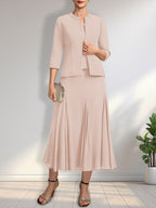 Vestido de novia de gasa, corte línea A, escote redondo, largo té, con lentejuelas y pedrería. 