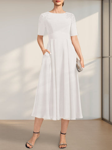 Vestido de corte A, escote redondo, largo té, de gasa, para la madre de la novia, con apliques de encaje y lentejuelas.