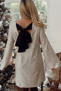 Robe mini ample à sequins et nœud papillon dans le dos, inspirée par Lost in Your Eyes 