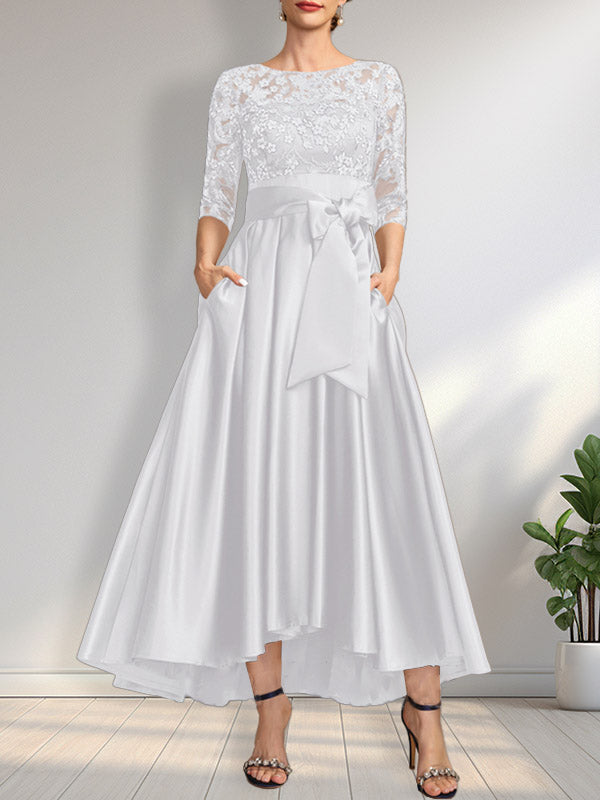 Vestido de madrina de la novia, corte asimétrico, escote ilusión, satén y encaje, con lazo.