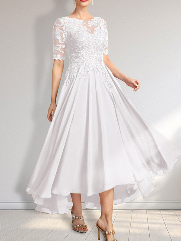 Robe de mère de la mariée asymétrique en mousseline de soie et dentelle, coupe trapèze, décolleté illusion, ornée de sequins 