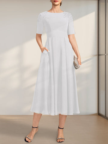 Vestido de corte A, escote redondo, largo té, de gasa, para la madre de la novia, con apliques de encaje y lentejuelas.