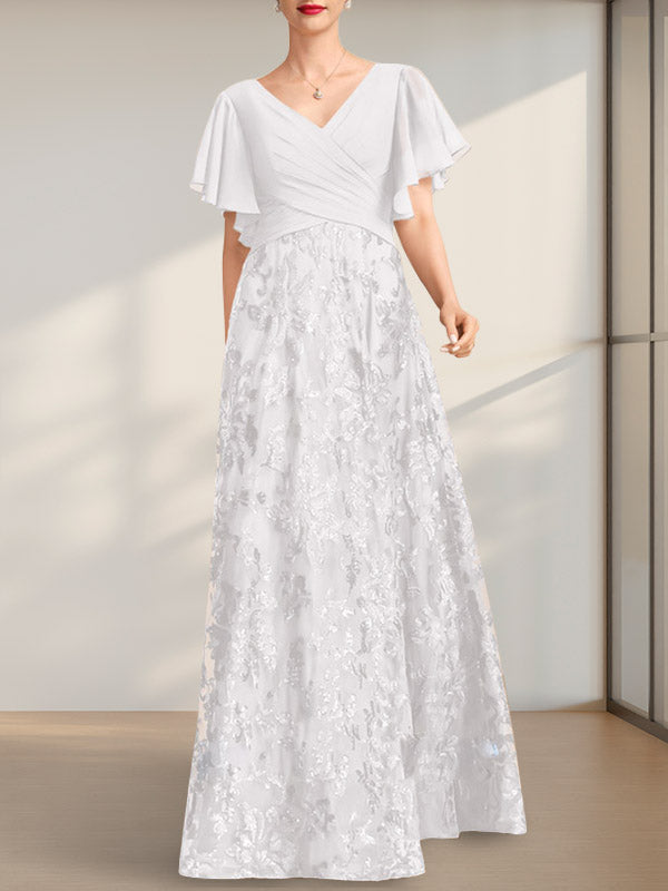 Vestido de novia de corte A, escote en V, largo hasta el suelo, de encaje, lentejuelas y gasa, con pliegues.
