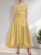 Vestido de madrina de la novia, corte asimétrico, escote ilusión, satén y encaje, con lazo.