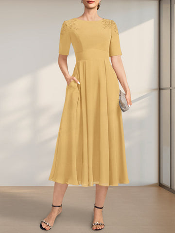 Vestido de corte A, escote redondo, largo té, de gasa, para la madre de la novia, con apliques de encaje y lentejuelas.