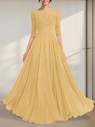 Vestido de novia de corte A, escote ilusión, largo hasta el suelo, de gasa y encaje, con lentejuelas plisadas.