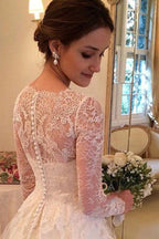 Magnifiques robes de mariée trapèze à col en V, manches longues et traîne courte ornées d'appliqués