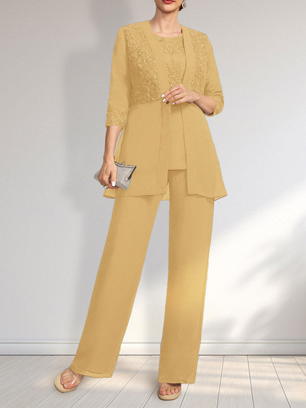 Vestido de novia de gasa con encaje y lentejuelas, estilo mono/traje pantalón, largo hasta el suelo, con escote redondo.