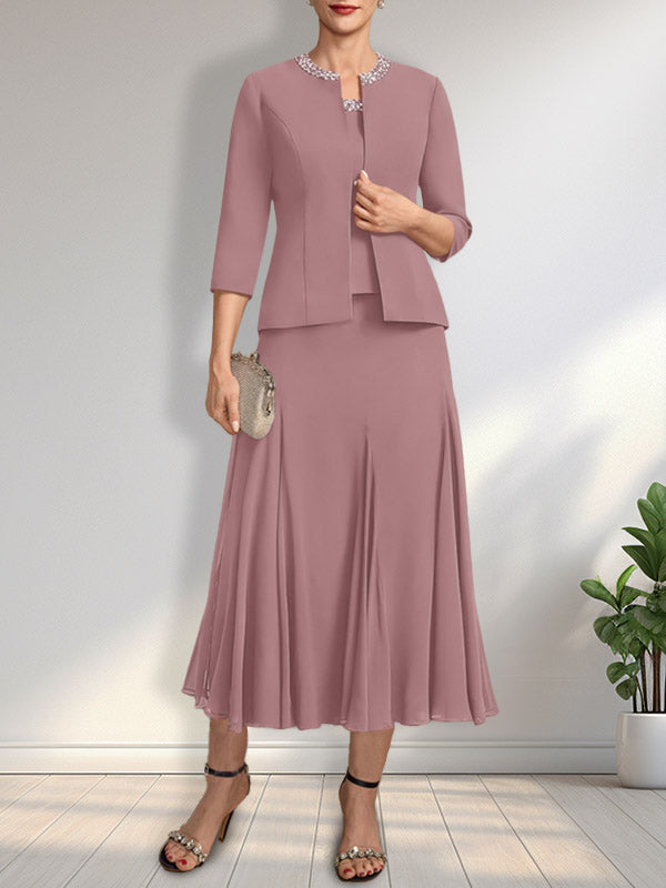 Vestido de novia de gasa, corte línea A, escote redondo, largo té, con lentejuelas y pedrería. 