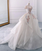 Impresionante vestido de novia de encaje con escote palabra de honor y flores Y1145