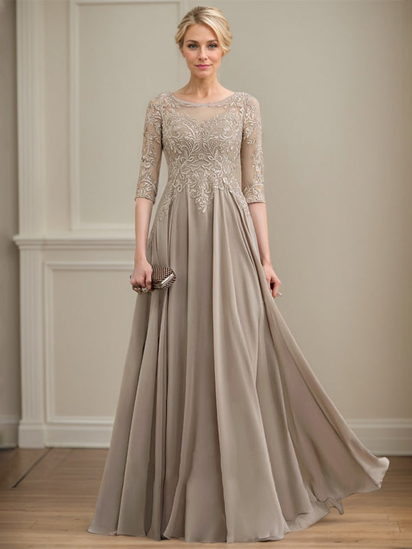 Vestido de novia de corte A, escote redondo, ilusión, largo hasta el suelo, de encaje y gasa con lentejuelas. 