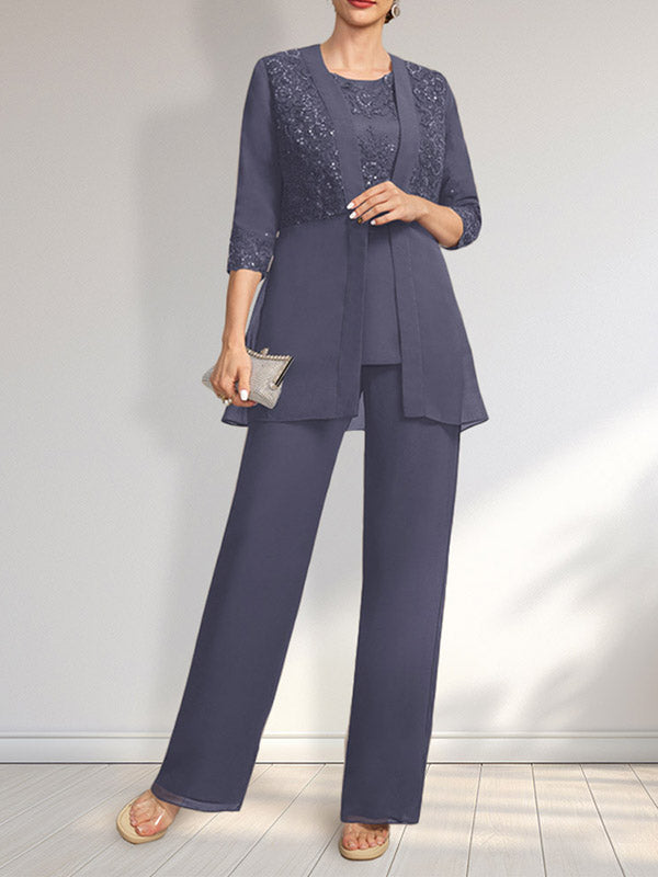 Vestido de novia de gasa con encaje y lentejuelas, estilo mono/traje pantalón, largo hasta el suelo, con escote redondo.
