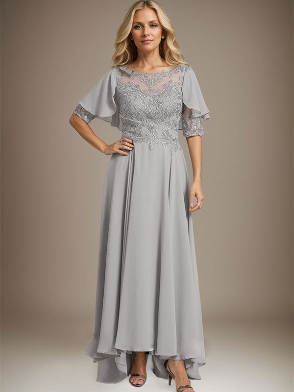 Vestido de novia asimétrico de gasa con encaje, corte en A, escote redondo y ilusión, con pedrería. 